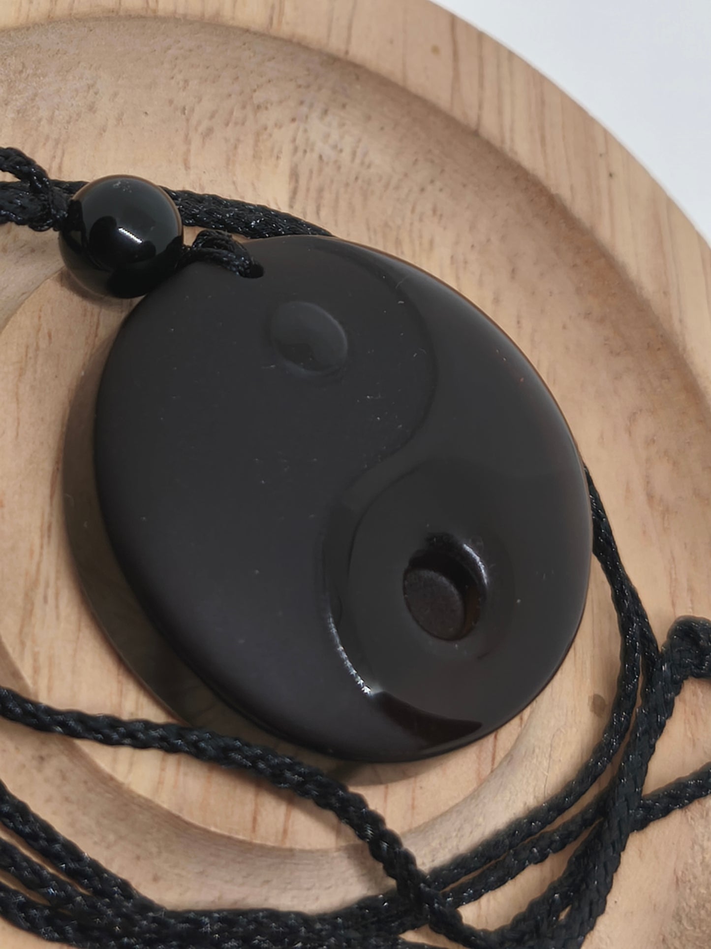 Collier yin yang en obsidienne glacée