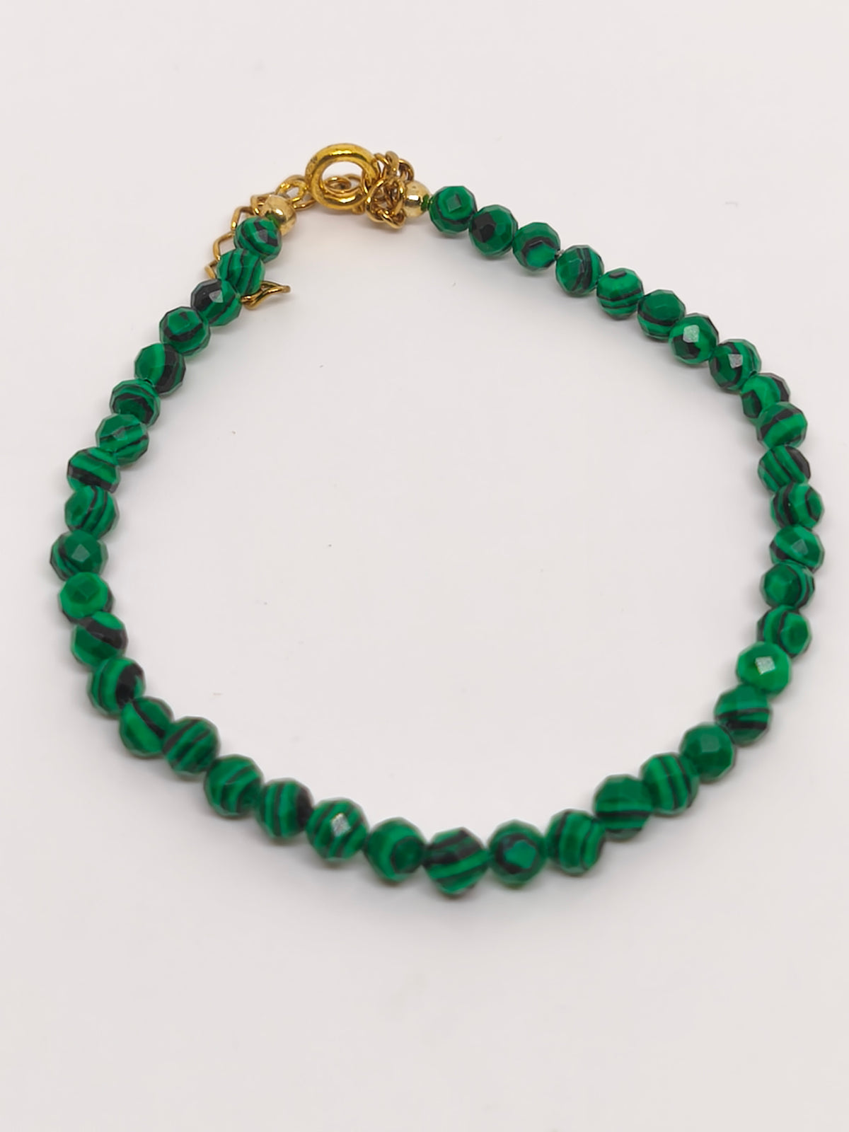 Bracelet en perles facettes de malachite résinée 3mm