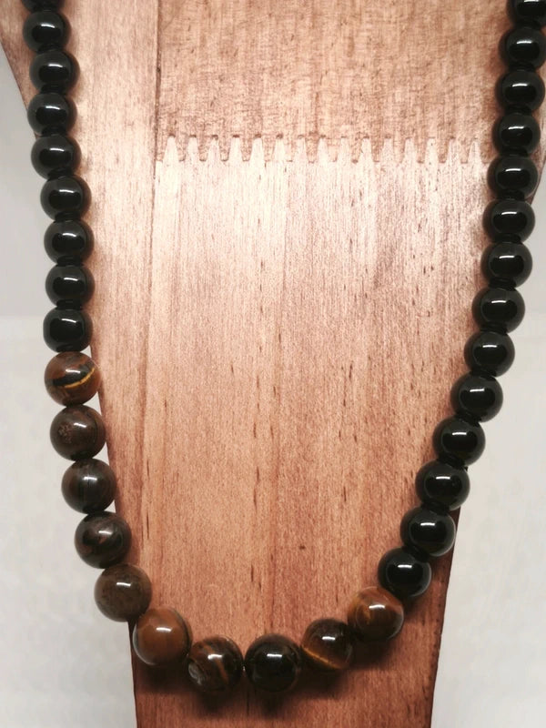 Collier élastique en oeil de tigre et d'onyx noire 8mm