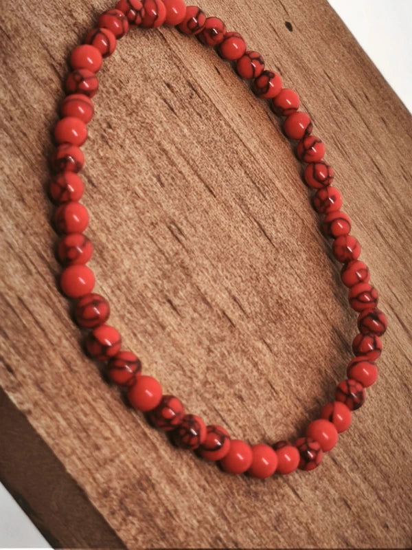 Collier et bracelet howlite rouge résinée