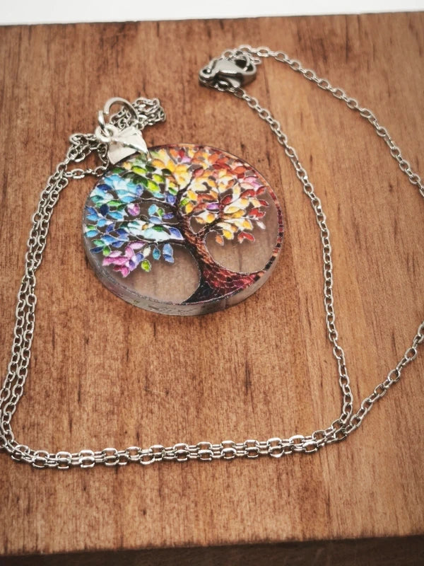 Collier arbre de vie en acier inoxydable et acrylique.