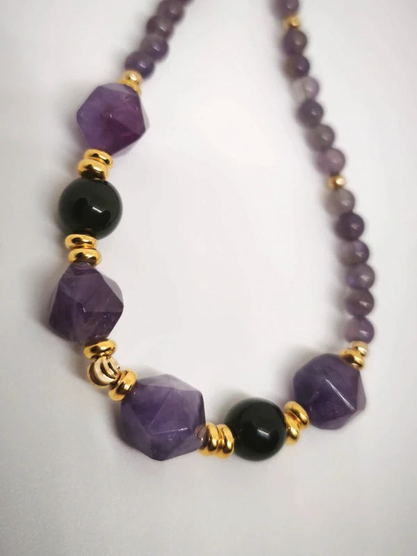 Collier en perles d'améthyste polies et facettes