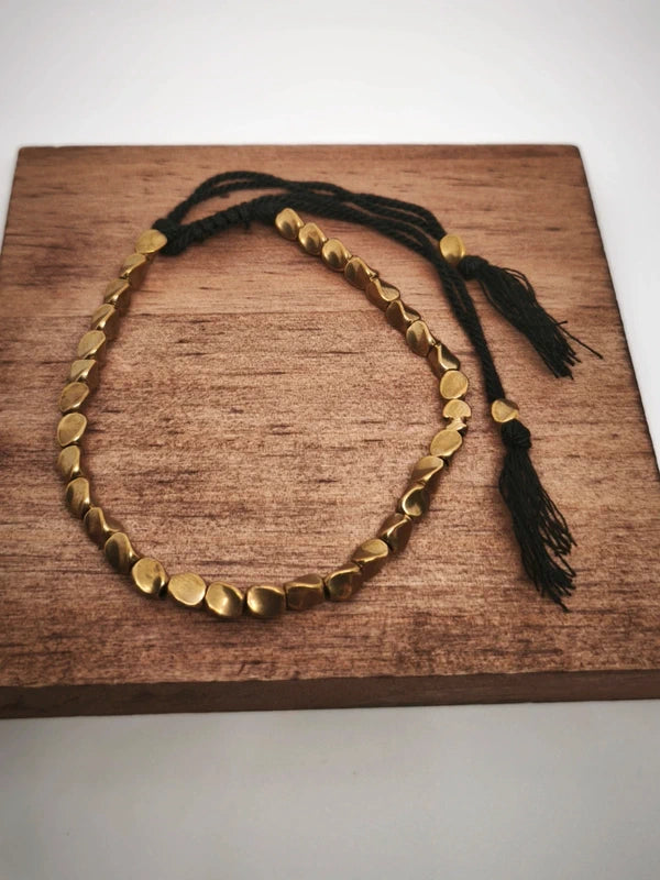 Bracelet tibétain en cuivre doré.
