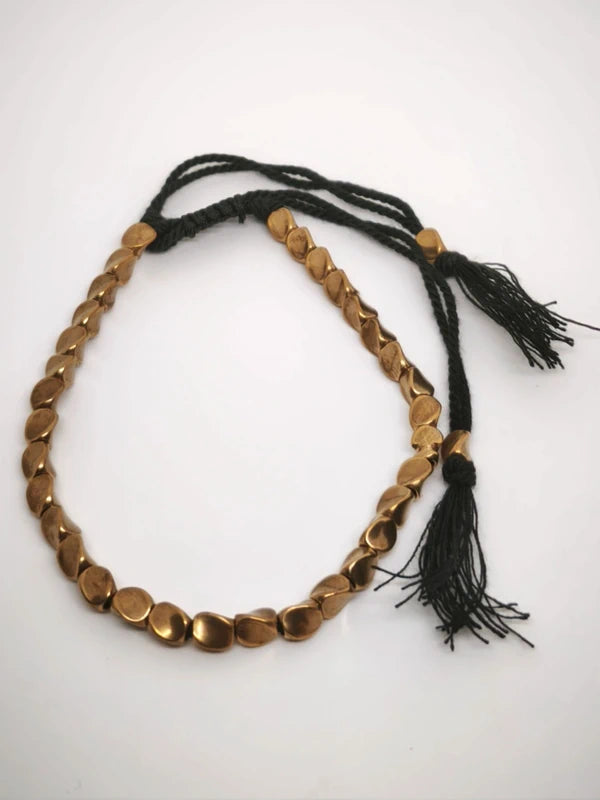 Bracelet tibétain en cuivre doré.