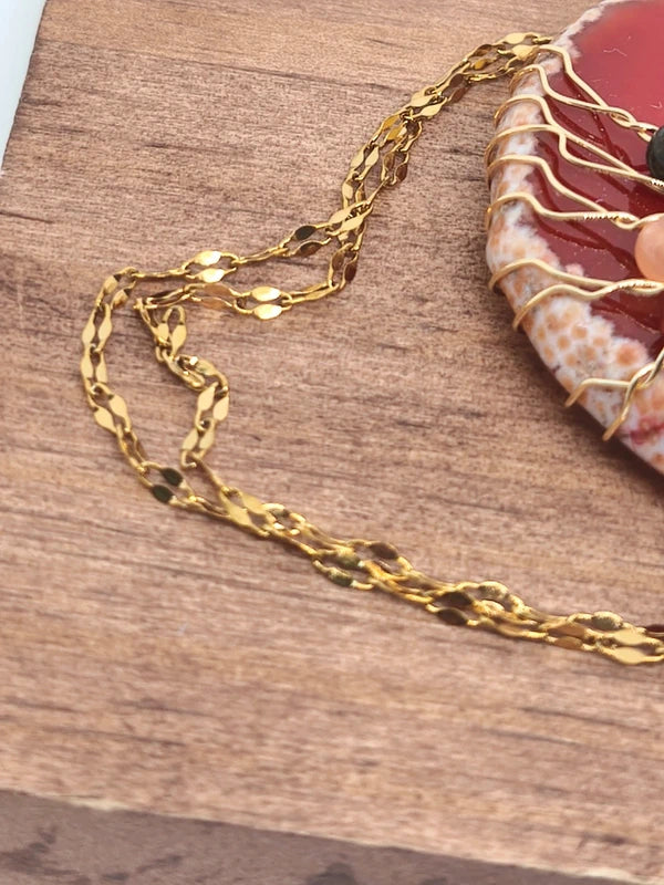 Collier en tranche d'agate rouge 7 chakras