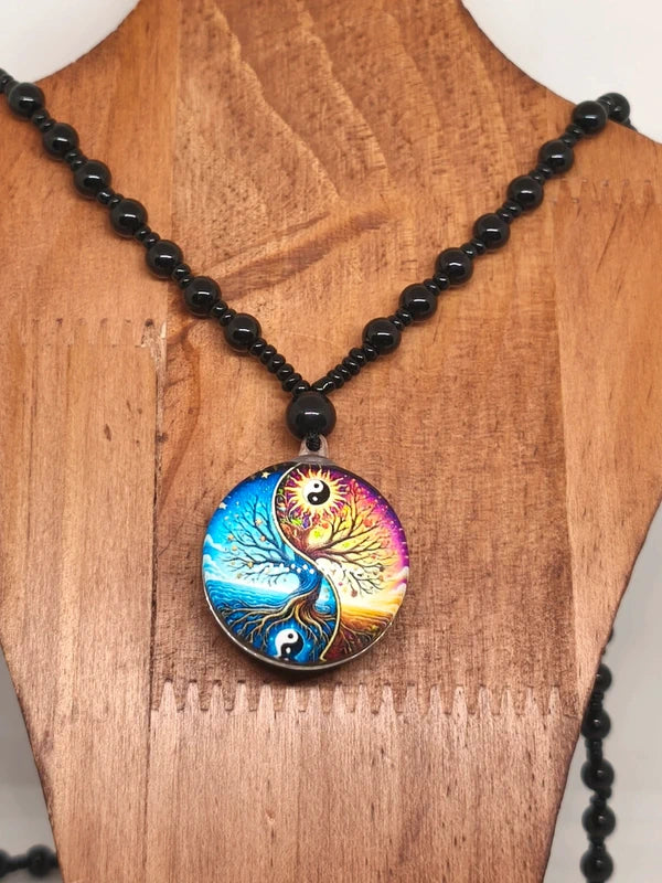 Collier yin-yang agate noire et résine
