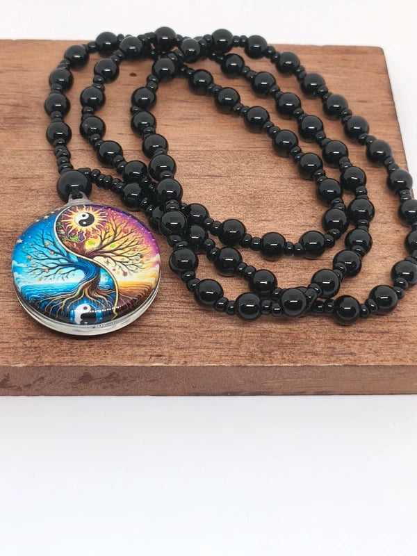 Collier yin-yang agate noire et résine