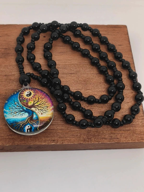 Collier yin-yang agate noire et résine