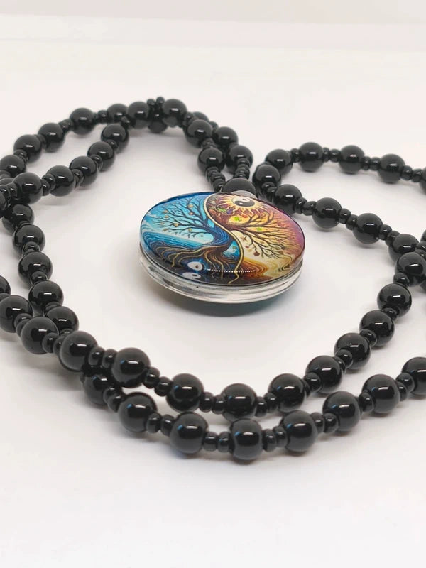 Collier yin-yang agate noire et résine