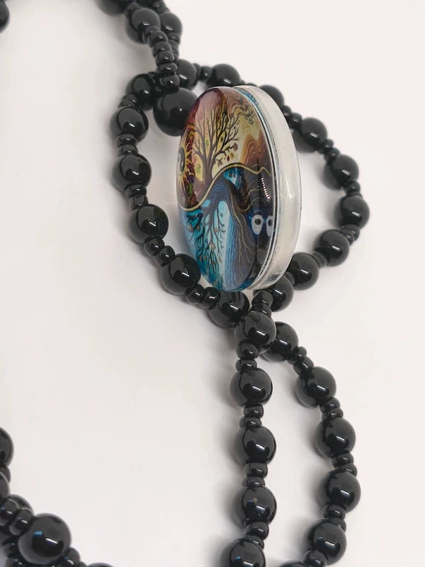 Collier yin-yang agate noire et résine