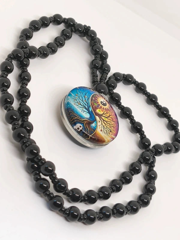 Collier yin-yang agate noire et résine