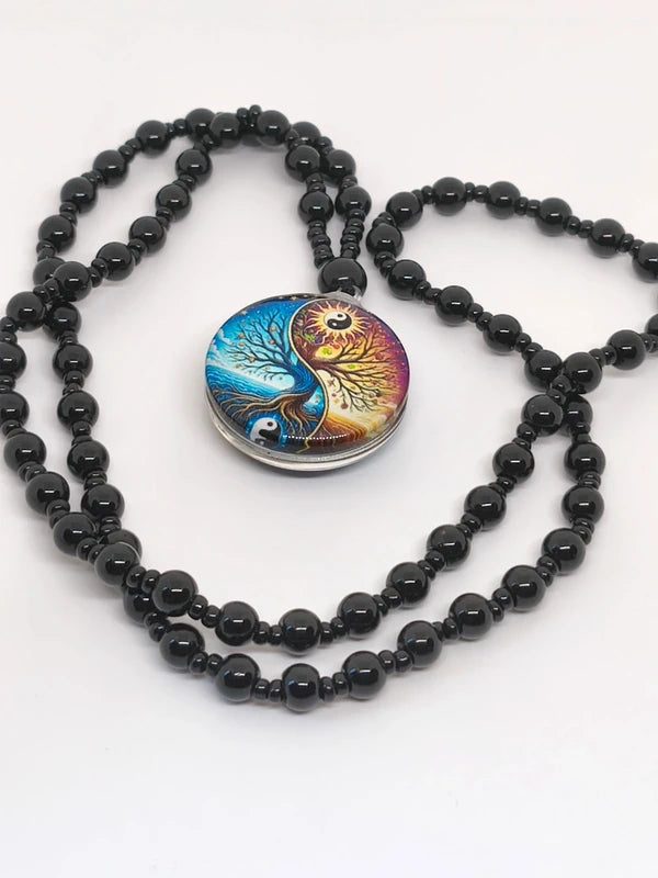 Collier yin-yang agate noire et résine