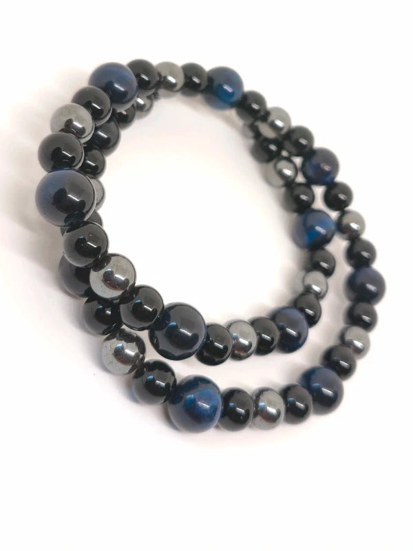 Collier en perles d'onyx noire, d'hématite, d'oeil de tigre bleu.