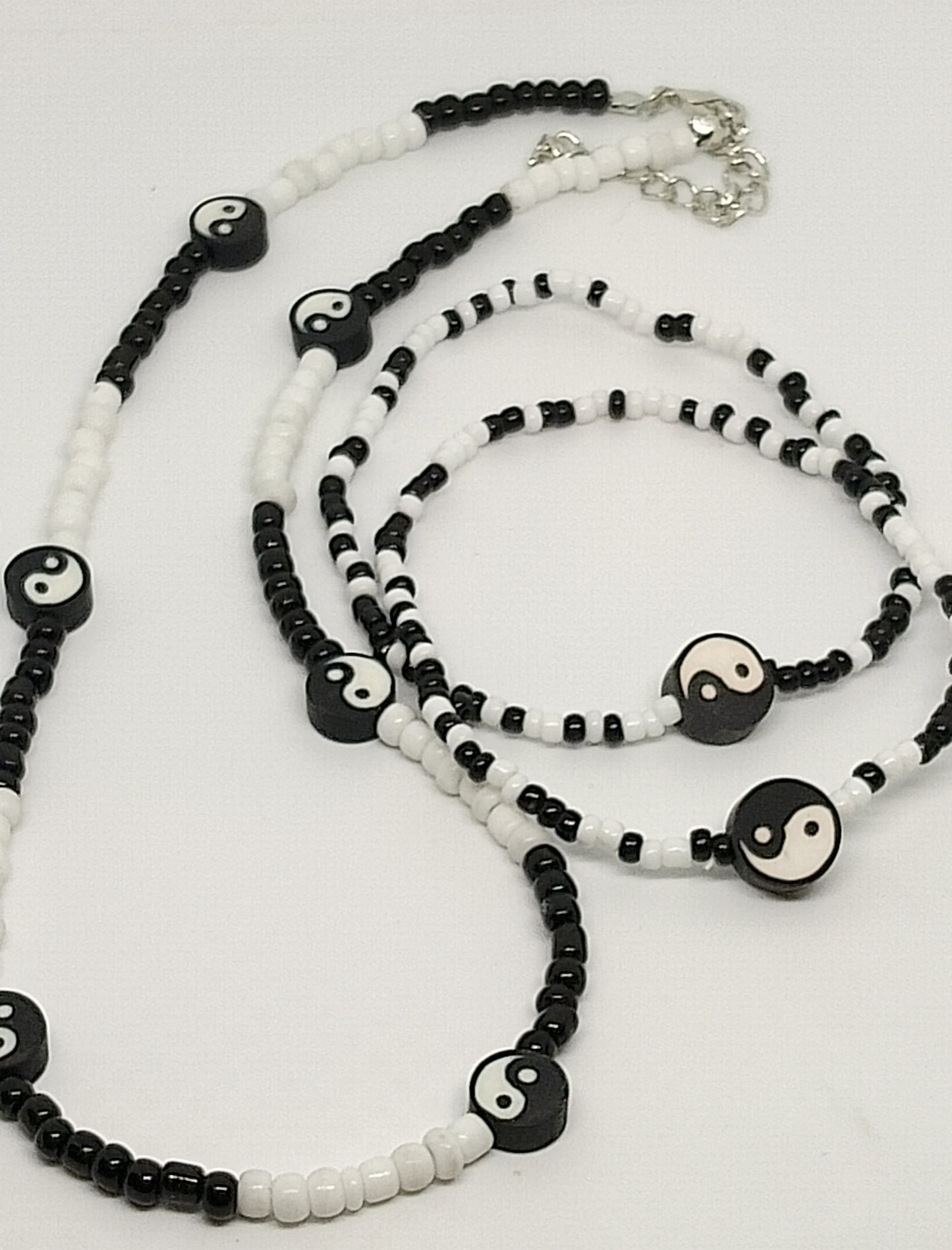 Collier et bracelets Yin Yang