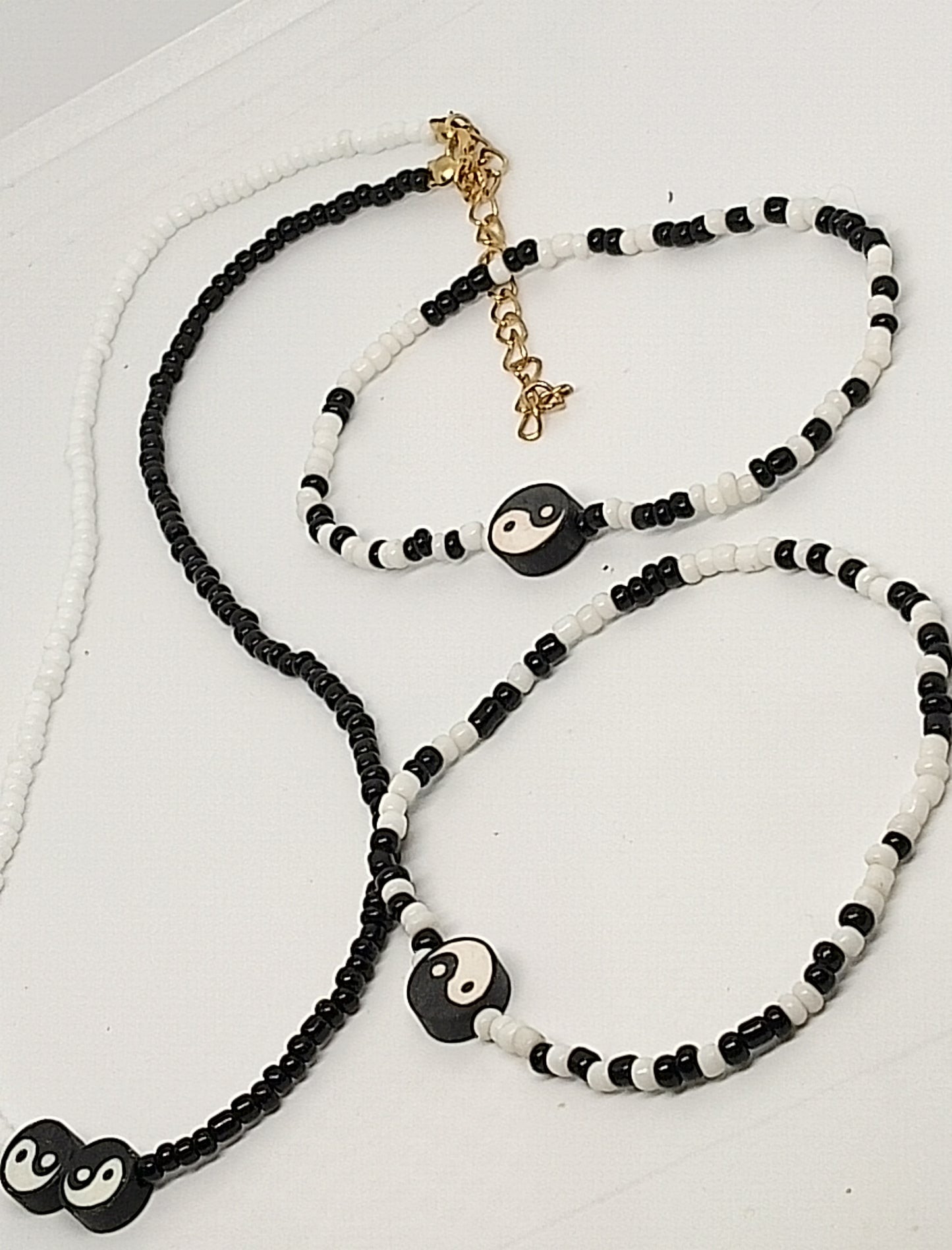 Collier et bracelet yin Yang