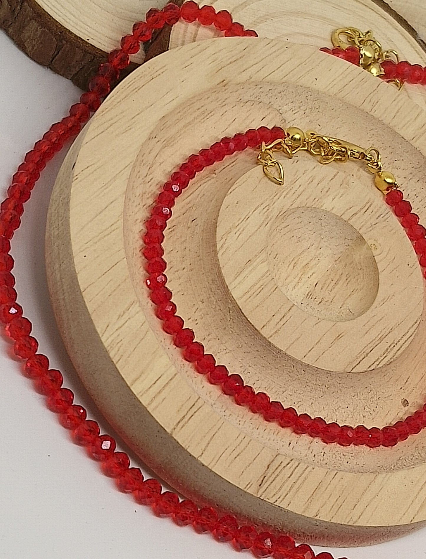 Collier et bracelet en verre coloré rouge