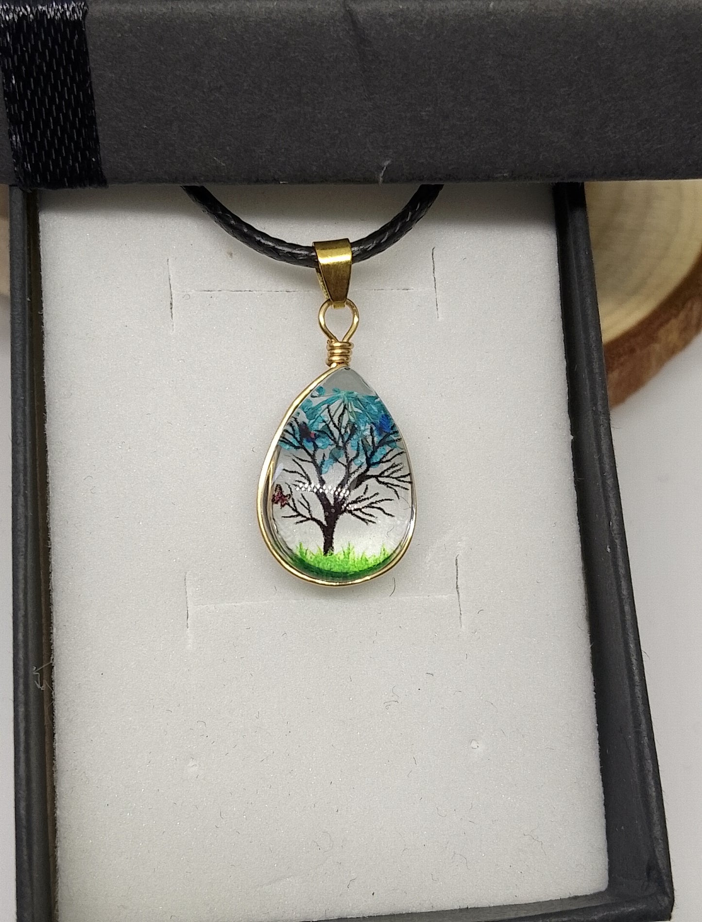 Collier en verre motif nature