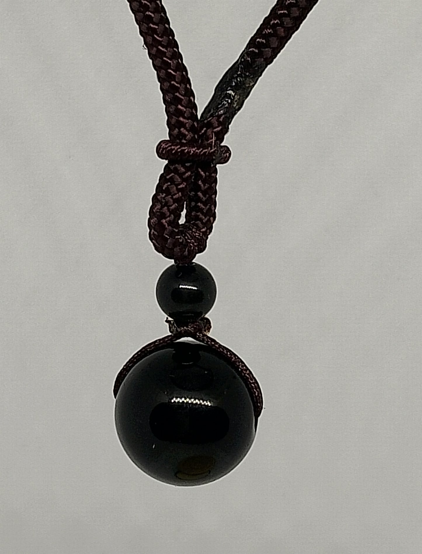 Collier perle obsidienne dorée