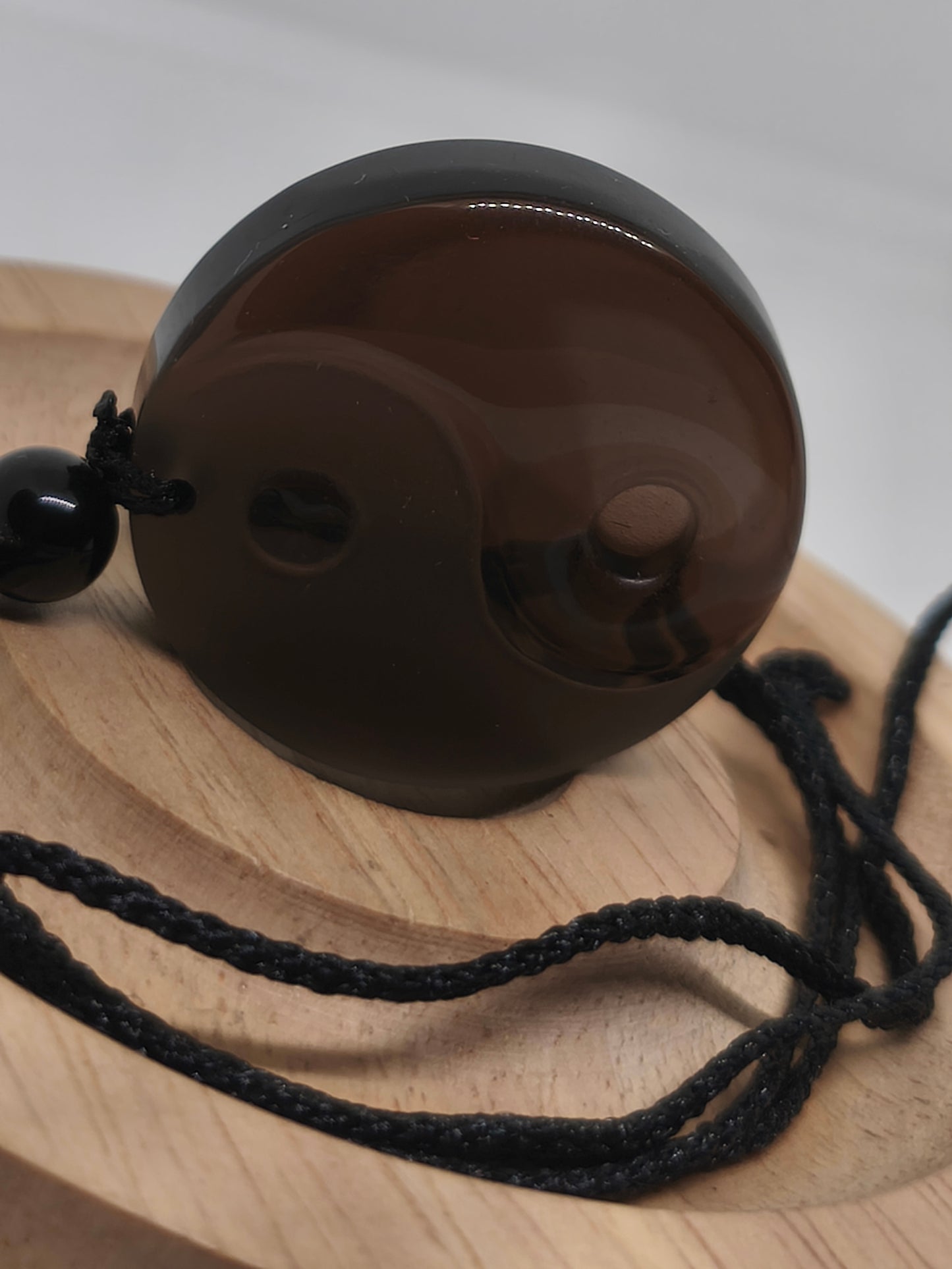 Collier yin yang en obsidienne glacée