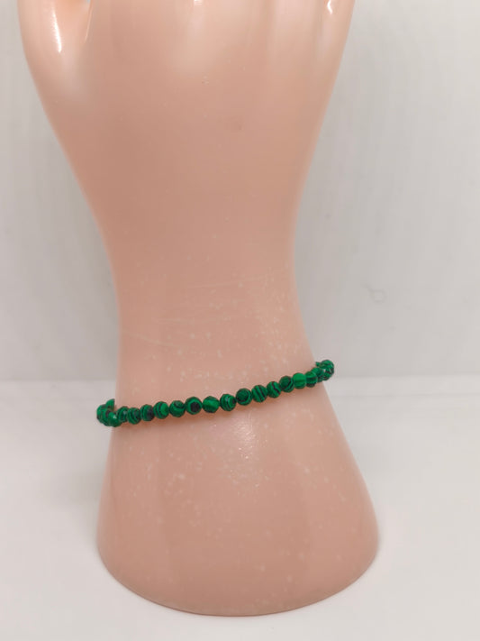 Bracelet en perles facettes de malachite résinée 3mm